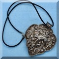 J24. Sterling silver and stone inlay pendant. 